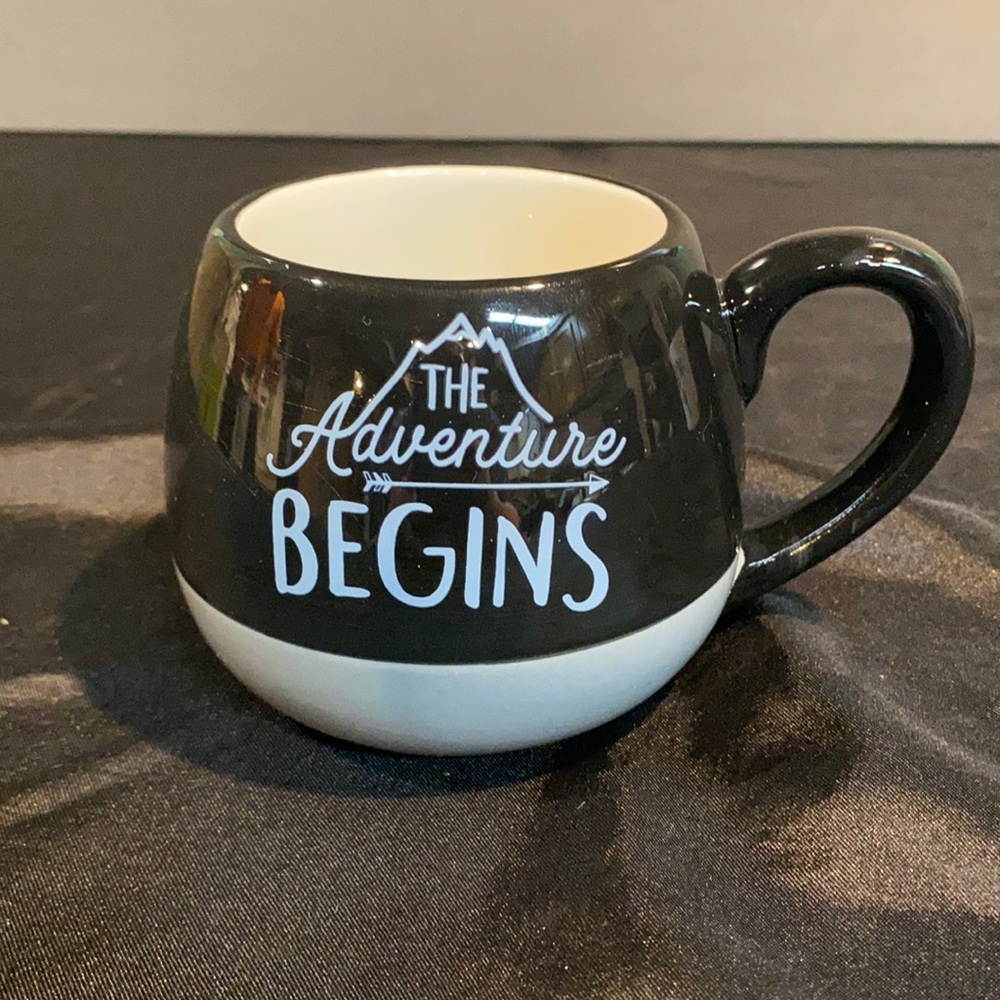 The adventure begins coffee mug.